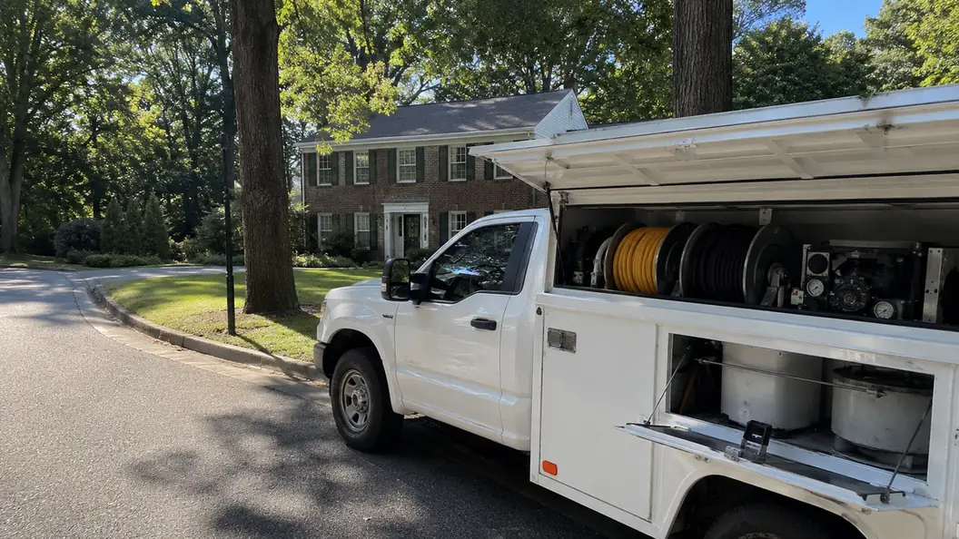 Concrete leveling service truck parked on a residential street in Columbia, MD