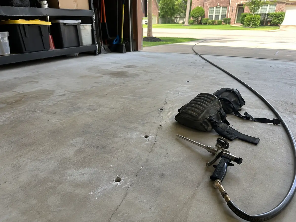 Leveling a sunken garage floor slab in Ellicott City, MD